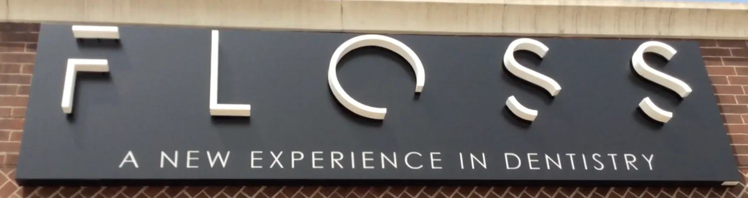 Exterior sign for FLOSS - a new experience in dentistry