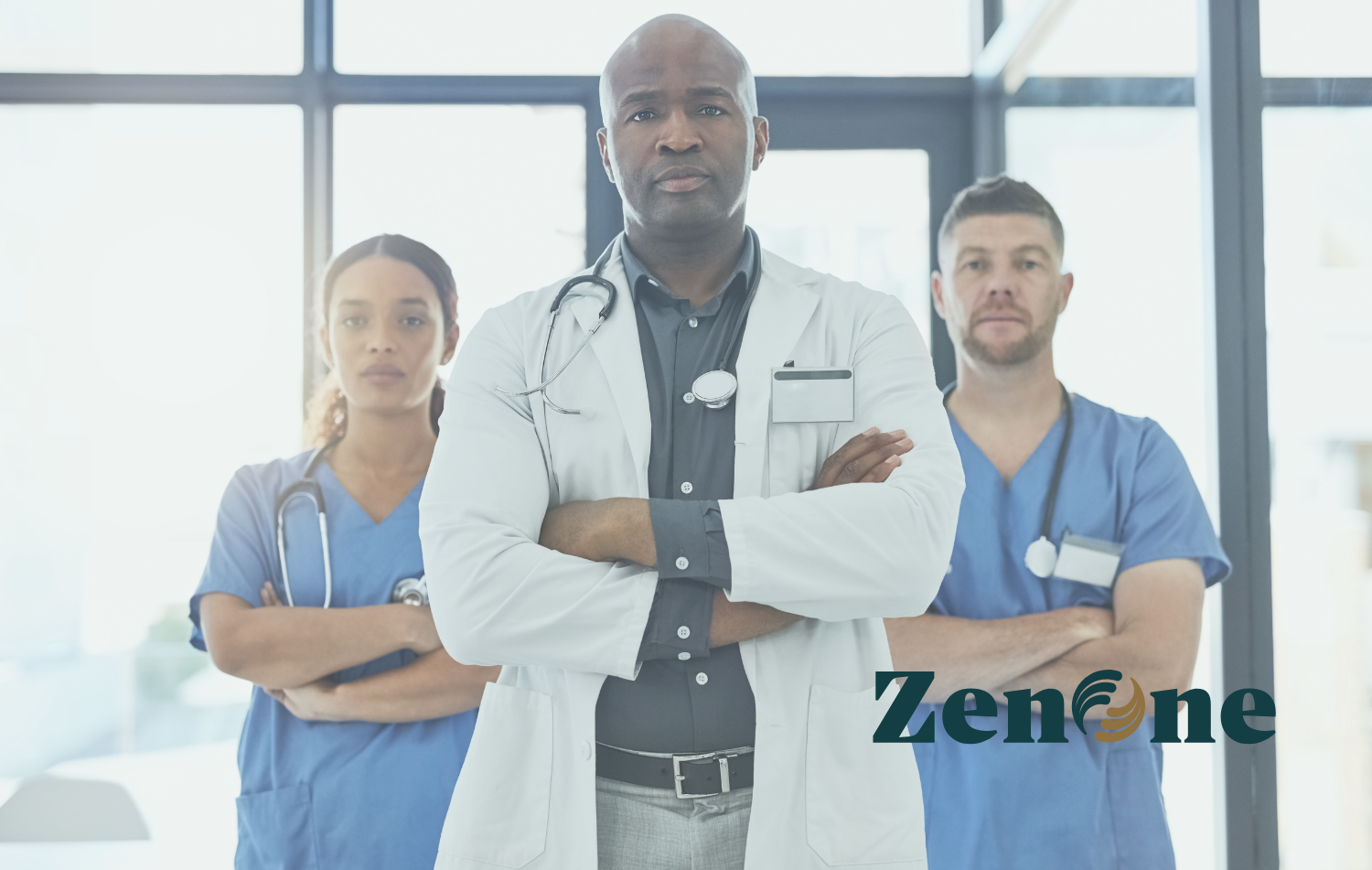 Dental practice team of three clinicians standing together in a bright modern office