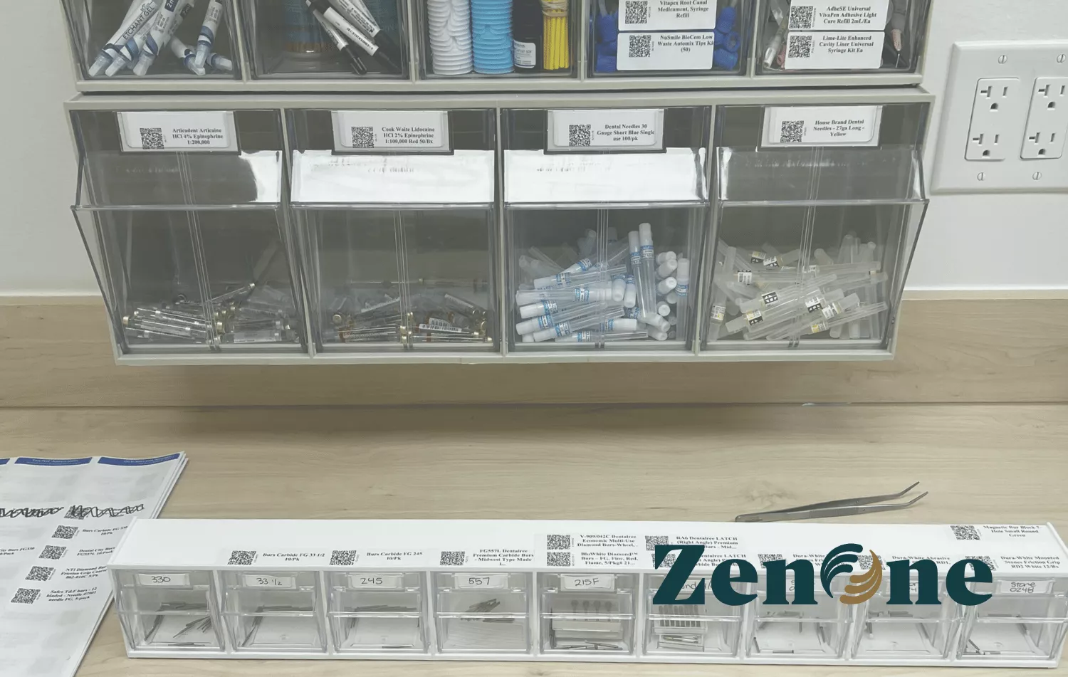 An organizer full of dental tools, featuring ZenOne's QR code system.