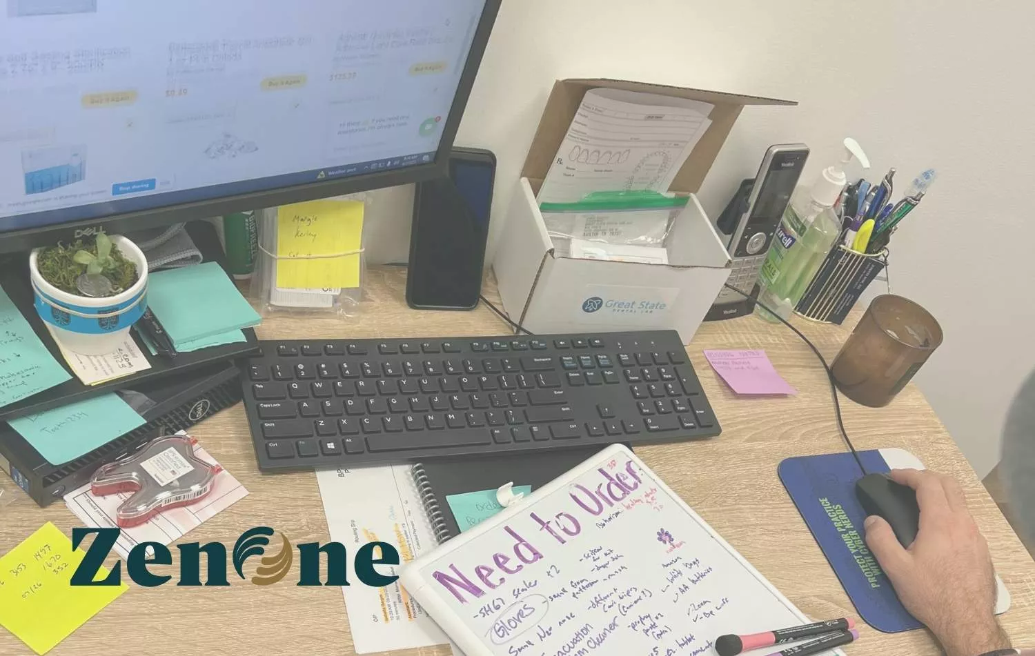 Dental office workstation with ZenOne branding, supply ordering software, and handwritten inventory notes for items that need to be ordered.